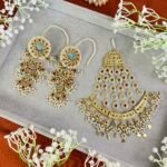 GOLDPLATED KUNDAN JHOOMER AND EARRINGS SET